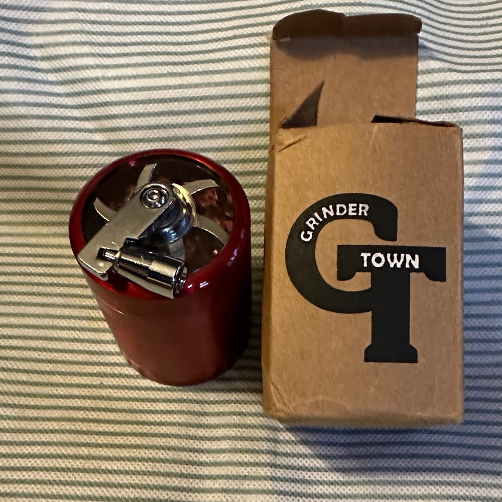 Red Metal Grinder